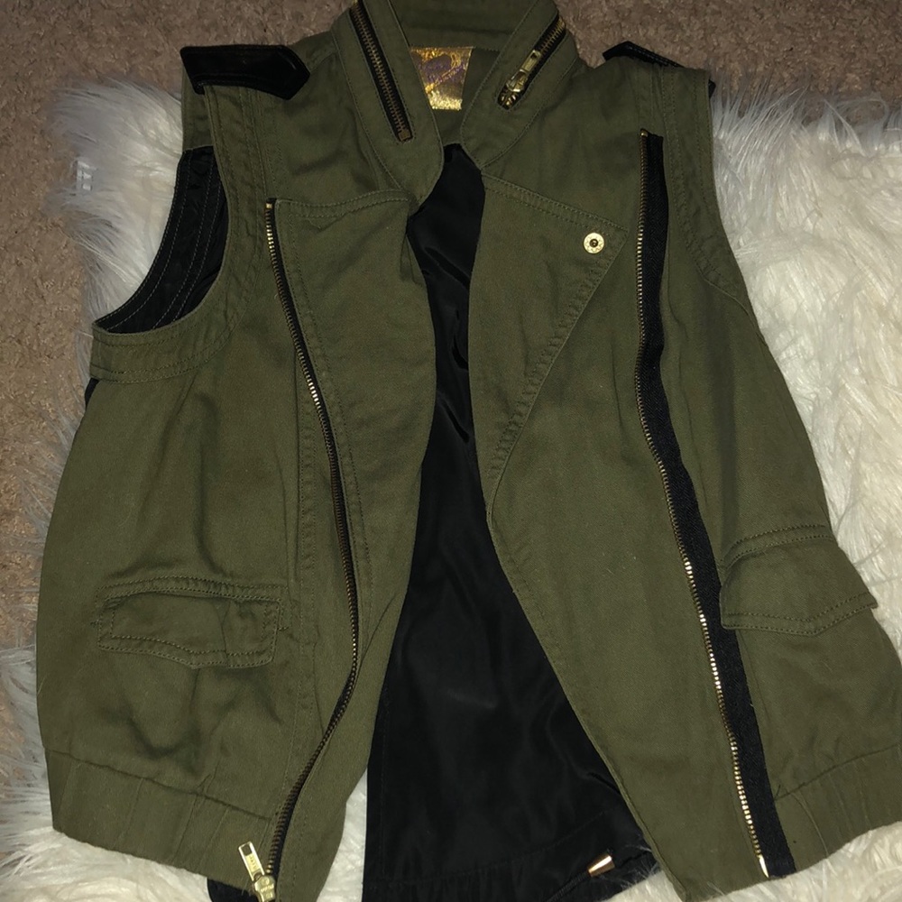 Olive green vest with faux leather detail